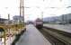 View west at Wurzburg in June 1990 with three types of electric locomotive in the station. From left to right are members of classes 103, 120 and 141. Note the yellow Deutsche Bundespost mail trolleys on the left waiting for the next set of mail bags.<br><br>[John McIntyre /06/1990]