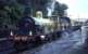 HR103 standing in the rain at Murthly on 21 August 1965. The locomotive and preserved Caledonian coaches were heading north to Inverness to participate in the Highland Railway Centenary celebrations.<br><br>[John Robin 21/08/1965]