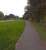 Looking along the B6179 Alfreton Road towards Derby, you may notice that the pavement is broad, and a long way from the road. It is built on the trackbed of a tramroad, which carried coal from <br>
Kilburn and Denby collieries before the MR Ripley branch took over that traffic. It opened in 1795 at 3 foot 6 inch gauge, and closed in 1908 after regauging to 4 foot. The trackbed curved away from the road towards the Derby canal approximately where the estate agent's sign can be seen to the right.<br><br>[Ken Strachan 13/09/2014]