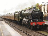 46115 <I>Scots Guardsman</I> charges through Bamber Bridge on 4 October with <I>The Lune Rivers Trust</I> special from Hellifield to Carlisle via Carnforth, Preston, Blackburn and the S&C. The train was running over 70 minutes late at this point but the Scot was working hard in an effort to make up lost time.<br><br>[John McIntyre 04/10/2014]