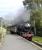 Ex-WD Austerity 2-8-0, liveried as BR 90733, draws into Oakworth station with a service to Haworth and Ingrow on 27th September 2014.<br><br>[Brian Taylor 27/09/2014]