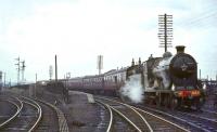 NB 256 <I>Glen Douglas</I> photographed at Bathgate on 30 March 1964 with the SLS <I>Scottish Rambler no 3</I> during a water stop on its way to Edinburgh.<br><br>[John Robin 30/03/1964]