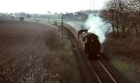 BR Standard tank 80054 nears Thorntonhall with a train on a chilly morning in April 1966, during the final week of steam haulage on the East Kilbride line. <br><br>[John Robin /04/1966]
