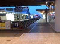 The dead end platforms 11 and 12 at London Bridge, unusually devoid of trains. Photographed looking east from the concourse at dusk on 12th June 2014. [See image 10056]<br><br>[Ken Strachan 12/06/2014]