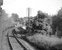 View from a morning commuter train for Glasgow approaching Thornliebank on 20 June 1964 behind BR Standard tank 80120. [Ref query 6894] <br><br>[John Robin 20/06/1964]