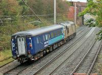 Light work for a Type 3. A very grubby DRS 37409 <I>'Lord Hinton'</I>, presumably on a break from Sandite duties, takes a much cleaner MkII Brake from Kingmoor to Crewe Gresty Bridge through Hest Bank on 22nd October. <br><br>[Mark Bartlett 22/10/2014]