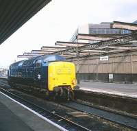 Deltic 55013 <I>The Black Watch</I> rumbles east through Haymarket station en route from 64B to Waverley on 15 June 1981.<br><br>[Peter Todd 15/06/1981]