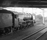 46233 <I>Duchess of Sutherland</I> has left the stock of the <I>Cumbrian Mountain Express</I> in the sidings at Carlisle on 6 September and is moving forward under Victoria Viaduct prior to reversing down to Upperby for servicing.<br><br>[Bill Jamieson 06/09/2014]