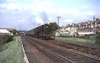Britannia Pacific 70008 <I>Black Prince</I> takes the 5.30pm Glasgow - Carlisle train south through Crossmyloof on 25 May 1965. <br><br>[John Robin 25/05/1965]