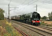 With its exhaust clinging to the boiler 46233 <I>Duchess of Sutherland</I> forges north at Brock on 25 October with the <I>Appleby Explorer.</I> The Pacific hauled the train from Crewe direct to Appleby via Shap avoiding Carlisle by using the curve at Upperby. <br><br>[Mark Bartlett 25/10/2014]