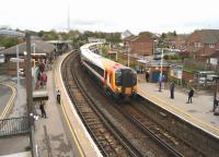 Platform scene at Dorchester South on 24 October 2014 as SWT emu 444004 calls at platform 2 with a Waterloo to Weymouth service.<br><br>[John McIntyre 24/10/2014]