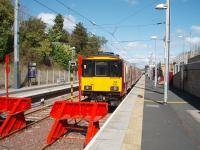 318250, newly arrived from Milngavie, stands in the sunshine at the Larkhall buffer stops in April 2008. <br><br>[Mark Bartlett 17/04/2008]