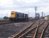 20226 stands in the yard at Bathgate on 26 May 1982, waiting to take out an empty car transporter train. Bathgate Central signal box is on the right [see image 25135].<br><br>[Peter Todd 26/05/1982]