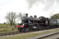 Ivatt class 2MT 2-6-0 46447 with a train at Cranmore on the East Somerset Railway on 26 October 2014.<br><br>[Peter Todd 26/10/2014]