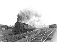 Parkhead V3 2-6-2T no 67676 tops the 1:88 grade westbound at Kelvinhaugh Junction on 14 July 1961 with a Bridgeton Central - Helensburgh Central train.<br><br>[G H Robin collection by courtesy of the Mitchell Library, Glasgow 14/07/1961]