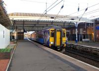 The 08.37 for Stranraer waits to leave Platform 3 at Ayr on 10 November 2014.<br><br>[Colin Miller 10/11/2014]