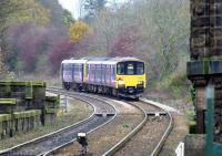 The 14.15 for York approaches Knaresborough on 13 November 2014, complete with moustache for 'Movember'. The last two vehicles are Class 142 Pacers, or 'nodding donkeys'. Being in one of these was akin to riding in a mineral wagon at Waterside.<br><br>[Colin Miller 13/11/2014]