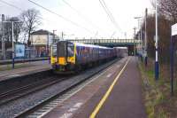 TransPennine 350406 on a service from Manchester Airport to Glasgow Central, passes Leyland on 11 December 2014.<br><br>[John McIntyre 11/12/2014]