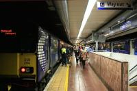 Evening rush hour at Argyle Street station on 15th December 2014, the first week day of the new timetable which extended the newly electrified Whifflet traffic to Motherwell and Milngavie.<br><br>[Colin McDonald 15/12/2014]