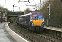 ScotRail 334001, ultimate destination Cumbernauld, leaves Alexandra Parade heading north for Barnhill and Springburn on the morning of 23rd December 2014.<br><br>[Colin McDonald 23/12/2014]