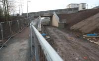 The new bridge that will carry Winston Road over the Borders Railway, now open to traffic. View is north west from the pedestrian walkway/cycleway, now relocated to the west side of the trackbed. The Red Bridge and Tweedbank are behind the camera.<br><br>[Ewan Crawford 26/12/2014]