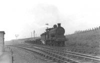 Pickersgill 0-6-0 57652 descends gently towards Balornock Junction from the Possil direction with a freight on 10 June 1961. [Ref query 6568]   <br><br>[G H Robin collection by courtesy of the Mitchell Library, Glasgow 10/06/1961]