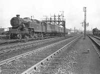 42243 approaching Rutherglen station on 17 May 1957 with a terminating service from Balloch. <br><br>[G H Robin collection by courtesy of the Mitchell Library, Glasgow 17/05/1957]