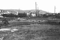 A view north west across the former turntable pit towards Aviemore signal box in April 1979. There appear to be one or two turntable parts in the pit which have probably arrived from Kyle of Lochalsh. A few years later they were re-assembled and the turntable returned to service. [See image 5329]<br><br>[John McIntyre /04/1979]