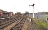 Looking north east from the end of platform 2 at Buxton station on a relatively quiet 5 January 2015. In the distance a class 66 can just be seen taking a northbound freight past Buxton signal box.<br><br>[Bruce McCartney 05/01/2014]