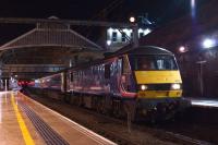 90021 stands at platform 4 of Preston station at just before 0100 on 6 January 2015 with the Aberdeen/Fort William/Inverness sleeper. The train will divide at Edinburgh Waverley.<br><br>[John McIntyre 06/01/2015]