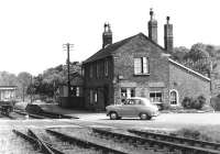 The 1853 station at Sledmere and Fimber in East Yorkshire, thought to have been taken in the mid 1950s. The platform had been shortened to handle surviving goods traffic following closure to passengers in 1950. The line closed completely in 1958 and little now remains here. [Ref query 6931] <br><br>[Peter Todd Collection //]