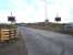 Looking east across the disused and non operational Huntsman Drive level crossing at Port Clarence on 15 October. The crossing is on the section of line running north to the Seal Sands chemical complex from the spur into the 'Greenergy' fuel terminal loading sidings. <br><br>[David Pesterfield 15/10/2014]