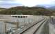 DMU 158826 seen from Llandecwyn station crossing the rebuilt Pont Briwet on 14 October 2014. Services from Harlech to Pwllheli resumed in September 2014 but the new road bridge is not expected to be open until June 2015.<br><br>[Colin McDonald 14/10/2014]