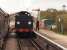 The signalman at Harmans Cross station on the Swanage Railway exchanges the single line tokens with the crew of a Swanage bound train on 19 October 2014.<br><br>[John McIntyre 19/10/2014]