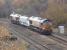 66102 leads in top and tail mode <br>
with 66007 as they run east towards Storrs Hill Road after extracting a long stored former National Power HKA coal wagon from Healey Mills Marshalling Yard. The wagon was to be moved by road to a Marcroft depot for refurbishment pending return to traffic.<br><br>[David Pesterfield 17/11/2014]