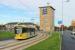 The brand new tram line to Manchester Airport opened in November 2014, over a  year early. The line involves a mixture of reserved and street running sections. One month after opening, Metrolink 3063 swings round the 15mph curve just to the north of Benchill tram stop heading for Manchester. <br><br>[Mark Bartlett 02/12/2014]