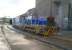 Scene at the Imerys Rocks china clay works at Goonbarrow Junction on 28th November 2014, as 0-6-0DH '<I>Isaac</I>' waits patiently for each wagon to be filled and covered [see image 49759]. <br><br>[Ken Strachan 28/11/2014]