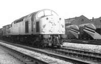 EE Type 4 no 242 passing the old Kingmoor steam shed with a southbound freight in May 1971.<br><br>[John Furnevel 22/05/1971]