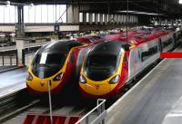 Twins - Glasgow Central and Manchester Piccadilly Virgin Pendolinos at London Euston in 2005.<br><br>[John Furnevel 23/07/2005]