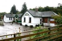 September in the rain at Spean Bridge in 2005, with the station building in use as a restaurant.<br><br>[John Furnevel 26/09/2005]