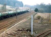 56029 climbing Beattock with an oil train in April 1999. <br><br>[John Furnevel 05/04/1999]