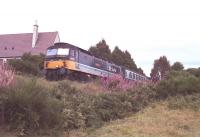 47 717 <i>Tayside Region</i> causes the sparks to fly with a heavy brake application on the approach to Aviemore, Summer 1990.<br><br>[John Gray //]