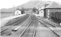 An August 1982 view of Achnasheen on the Inverness/Kyle of Lochalsh line. The signal box, semaphore signals and the goods shed no longer exist although some sidings remain for engineering use. <br><br>[John Gray //]