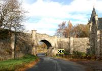 Bridge over the A939 just north of Grantown on Spey adjoining the gatehouse entrance to Castle Grant. A halt was provided here. <br><br>[John Furnevel 01/11/2005]