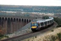 Southbound service passes over the Culloden Viaduct<br><br>[Ewan Crawford //2005]