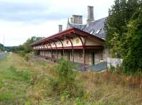 The surviving restored station building at Melrose in September 2003, looking west towards Tweedbank, a mile and a half away. The A6091 now runs past the site on the left.<br><br>[John Furnevel 16/09/2003]