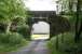 Old preserved overbridge crossing the trackbed of the line heading east out of Peebles towards Galashiels. The route now provides access to 'The Bridges' housing development. For the view from the other side [see image 31892].<br><br>[John Furnevel 21/05/2010]