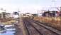 Looking north east towards Keith junction from the Dufftown branch in September 2004. The yard facilitates occasional timber loading and once served the Chivas distillery (on the right). The leftmost building of the Chivas complex incorporates part of the former GNSR locomotive shed (61C). [See image 36513]<br><br>[John Furnevel 12/09/2004]