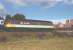 47 701 <i>Saint Andrew</i> gathers speed as it leaves Aviemore for Inverness, Summer 1990.<br><br>[John Gray //]