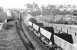 A type 2 takes empty coal hoppers south towards Ayr station in 1977.<br><br>[John Furnevel 14/06/1977]